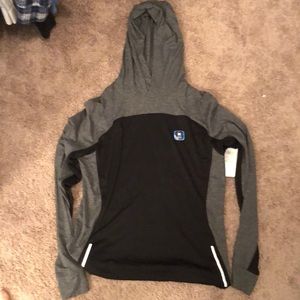 Brand new ASICS long sleeve hooded running shirt